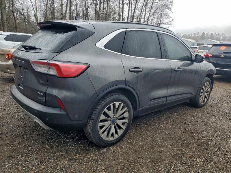 Photo 3 from auction – 2020 FORD ESCAPE TIT with VIN 1FMCU9DZ0LUC59949