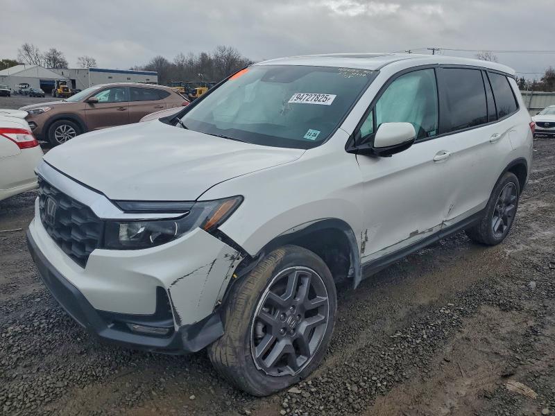 HONDA PASSPORT E 2023 with VIN 5FNYF8H53PB038253 - Photo from auction