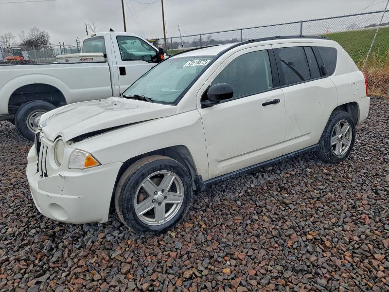 JEEP COMPASS 2007 with VIN 1J8FT47W27D211005 - Photo from auction