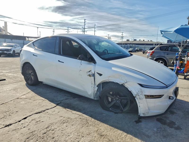 Фото 4 с аукциона – 2026 TESLA MODEL Y с VIN 7SAYGDEE7TF343892