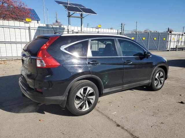 Photo 3 from auction – 2015 HONDA CR-V TOURI with VIN 5J6RM3H94FL018020