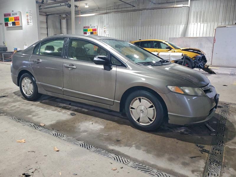 Photo 4 from auction – 2006 HONDA CIVIC HYBR with VIN JHMFA36276S006407