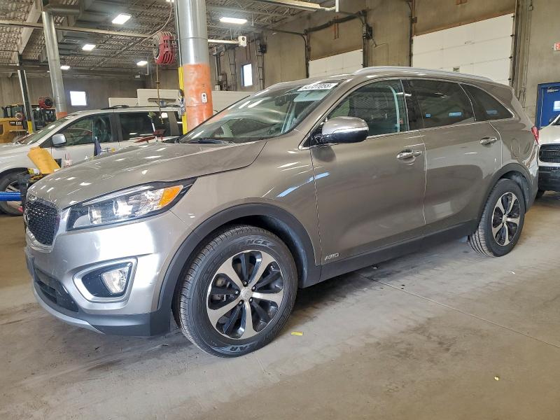KIA SORENTO EX 2016 with VIN 5XYPHDA19GG093949 - Photo from auction