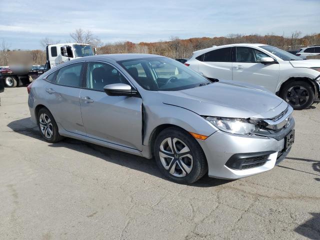 Photo 4 from auction – 2018 HONDA CIVIC LX with VIN 2HGFC2F51JH608933