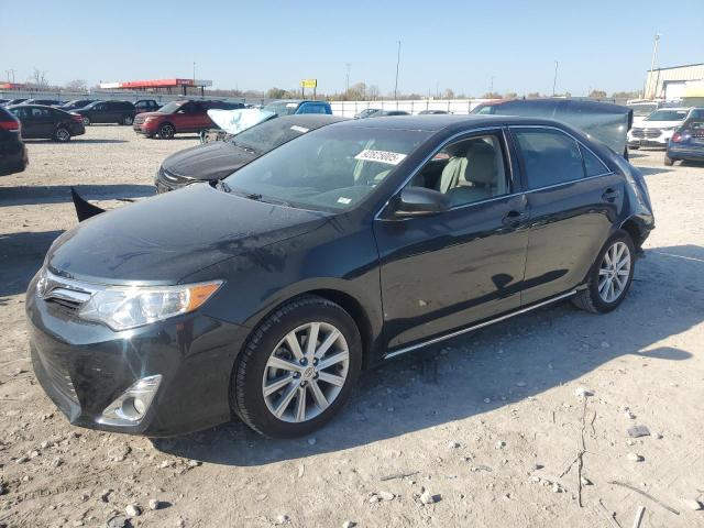 TOYOTA CAMRY L 2014 with VIN 4T4BF1FK8ER409404 - Photo from auction