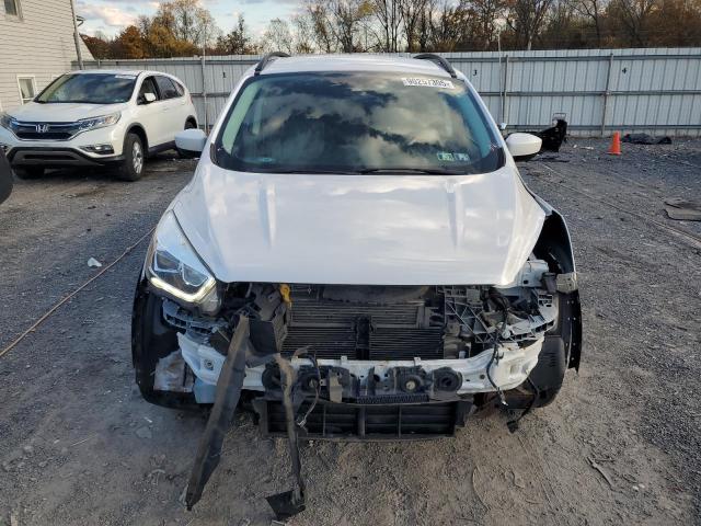 Photo 5 from auction – 2017 FORD ESCAPE SE with VIN 1FMCU9GD6HUD25962