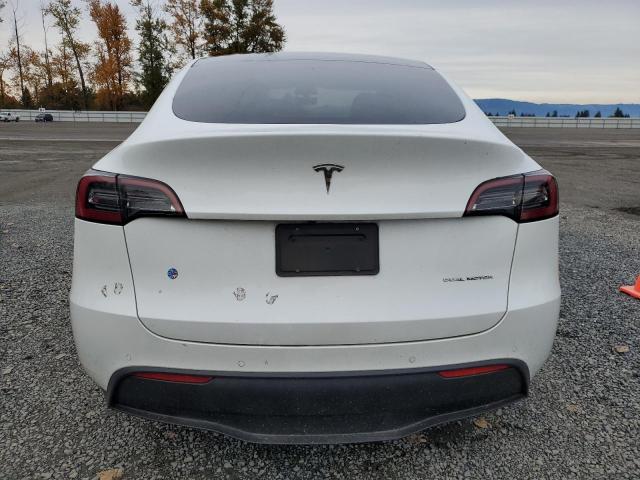Photo 6 from auction – 2022 TESLA MODEL Y with VIN 7SAYGAEE9NF487333