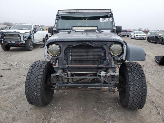 Photo 5 from auction – 2014 JEEP WRANGLER U with VIN 1C4BJWDG7EL281591