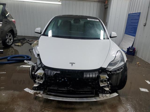 Photo 5 from auction – 2021 TESLA MODEL 3 with VIN 5YJ3E1EA3MF084697