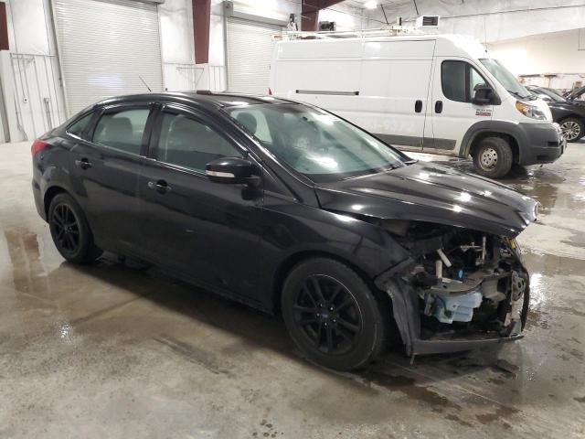 Photo 4 from auction – 2015 FORD FOCUS SE with VIN 1FADP3F22FL231602