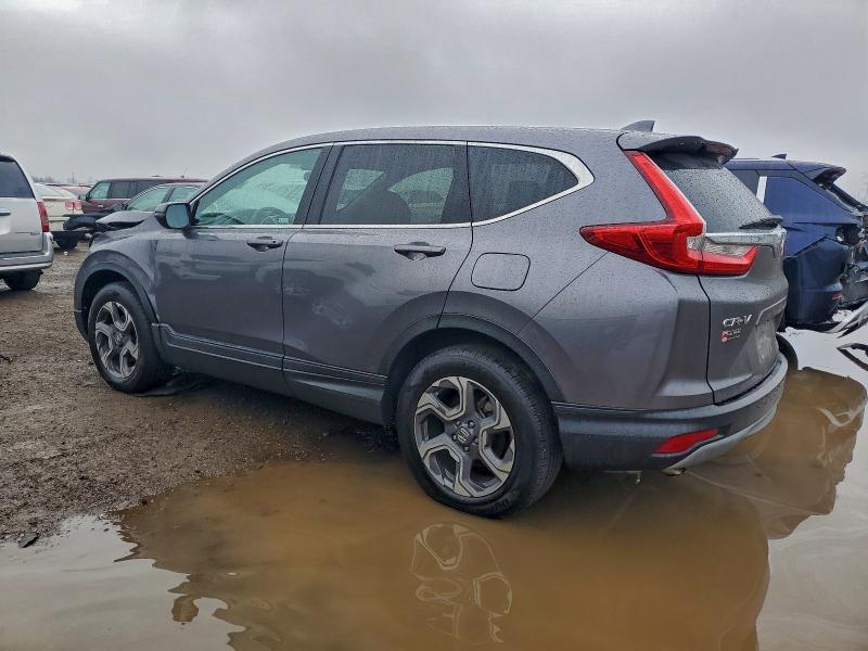 Photo 2 from auction – 2018 HONDA CR-V EX with VIN 7FARW2H52JE086825