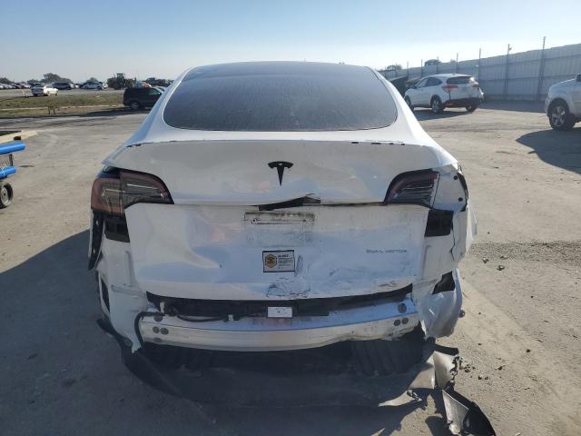 Photo 6 from auction – 2023 TESLA MODEL Y with VIN 7SAYGAEE6PF861688