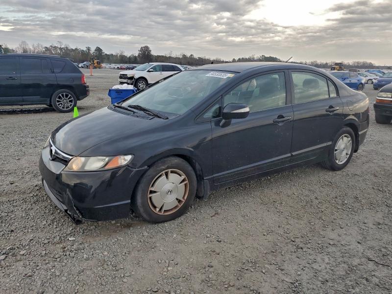 Photo 1 from auction – 2011 HONDA CIVIC HYBR with VIN JHMFA3F20BS000006