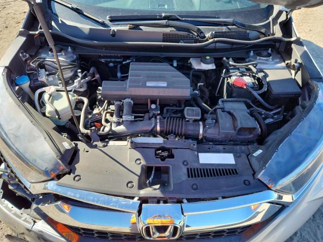 Photo 11 from auction – 2018 HONDA CR-V EX with VIN 7FARW2H58JE049908