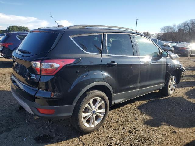 Photo 3 from auction – 2017 FORD ESCAPE SE with VIN 1FMCU0GD5HUC86406