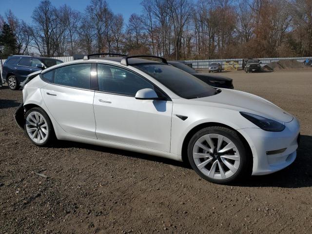 Photo 4 from auction – 2022 TESLA MODEL 3 with VIN 5YJ3E1EB2NF120681