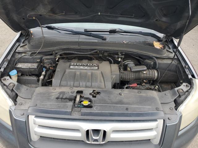 Photo 11 from auction – 2006 HONDA PILOT EX with VIN 2HKYF18736H538308
