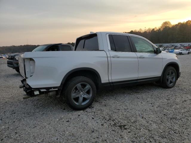 Photo 3 from auction – 2023 HONDA RIDGELINE with VIN 5FPYK3F52PB058308