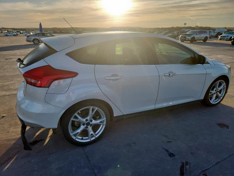 Photo 3 from auction – 2015 FORD FOCUS TITA with VIN 1FADP3N27FL333995