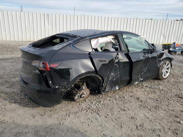 Photo 3 from auction – 2021 TESLA MODEL Y with VIN 5YJYGAEE2MF195163