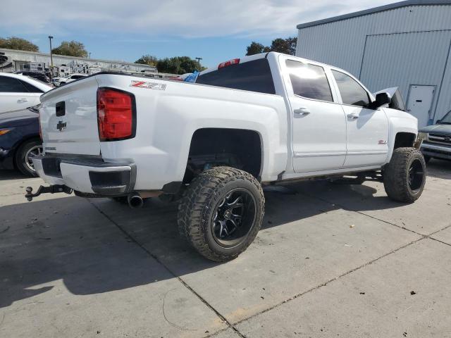 Photo 3 from auction – 2017 CHEVROLET SILVERADO with VIN 3GCUKREC9HG484342
