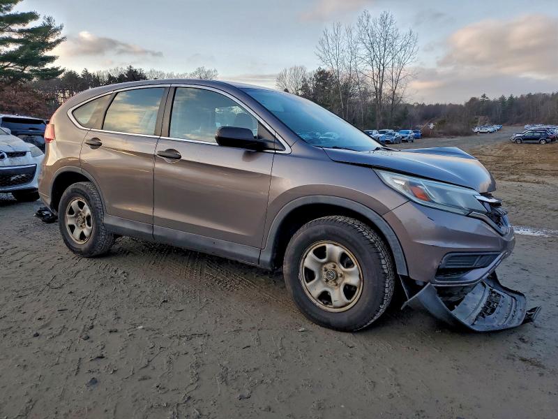 Photo 4 from auction – 2015 HONDA CR-V LX with VIN 3CZRM3H38FG712962