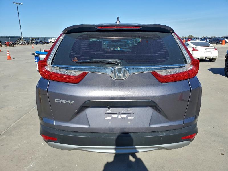 Photo 6 from auction – 2017 HONDA CR-V LX with VIN 7FARW5H37HE013055