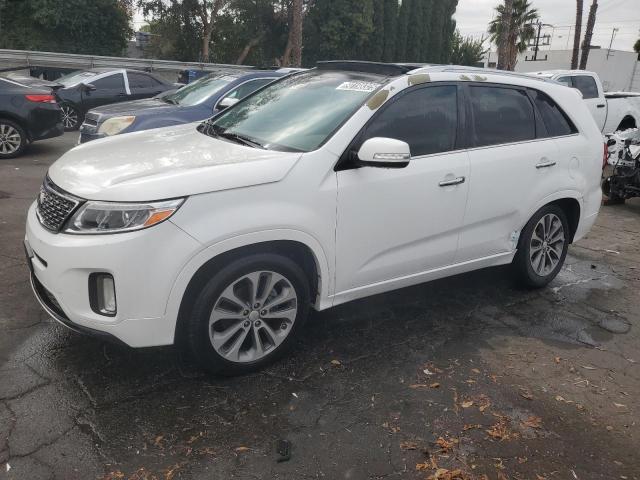 KIA SORENTO 2015 with VIN 5XYKW4A74FG582164 - Photo from auction