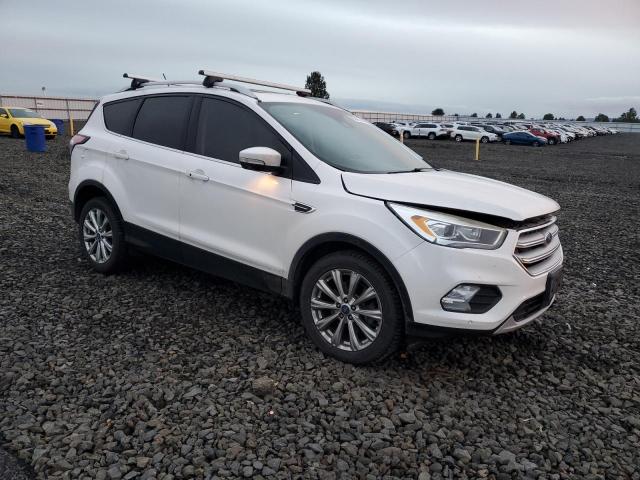 Photo 4 from auction – 2018 FORD ESCAPE TIT with VIN 1FMCU9J95JUA42852