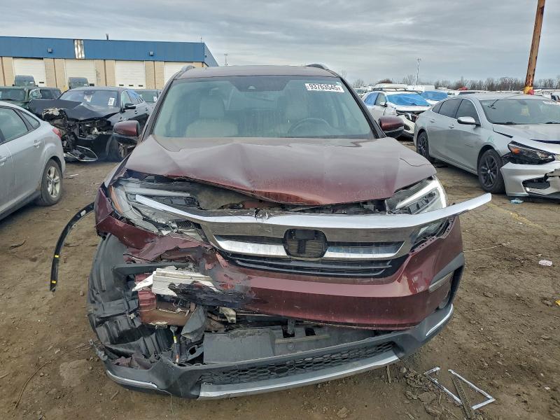 Photo 5 from auction – 2021 HONDA PILOT TOUR with VIN 5FNYF6H97MB025282