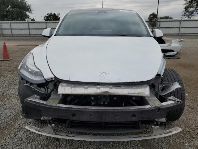Photo 5 from auction – 2021 TESLA MODEL Y with VIN 5YJYGDEE4MF214121