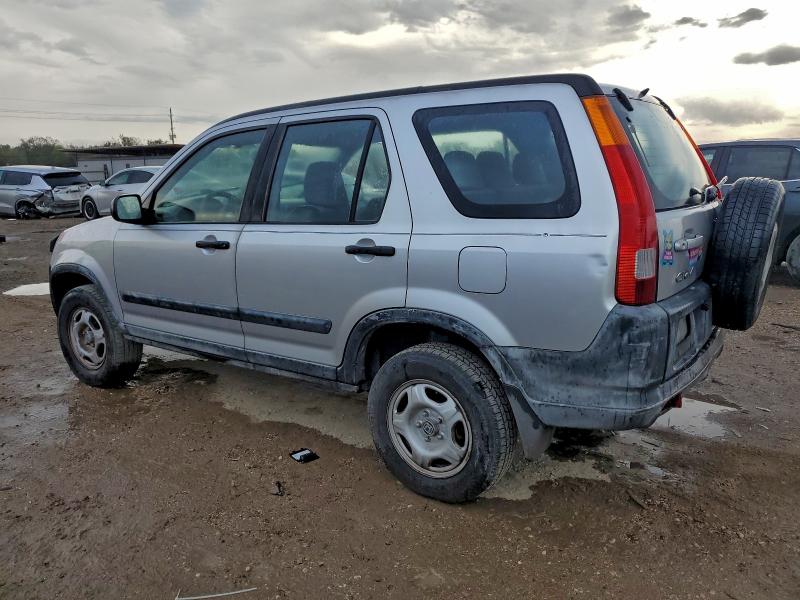 Photo 2 from auction – 2002 HONDA CR-V LX with VIN JHLRD68422C023080