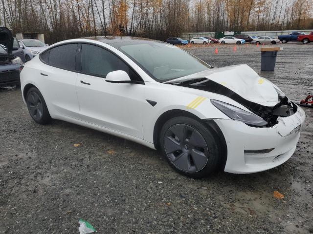 Photo 4 from auction – 2022 TESLA MODEL 3 with VIN 5YJ3E1EB8NF127540
