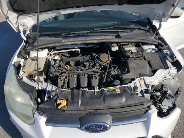 Photo 11 from auction – 2014 FORD FOCUS SE with VIN 1FADP3F29EL191680