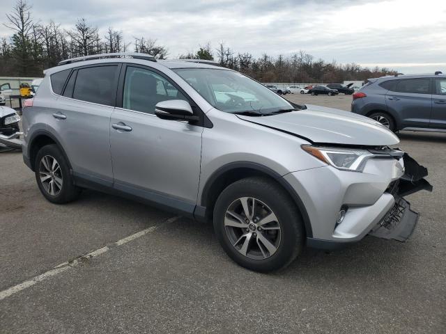 Photo 4 from auction – 2017 TOYOTA RAV4 XLE with VIN 2T3RFREV7HW650630