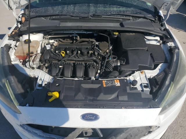 Photo 11 from auction – 2016 FORD FOCUS SE with VIN 1FADP3F24GL299000