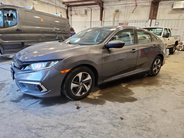 HONDA CIVIC LX 2019 with VIN 19XFC2F67KE023990 - Photo from auction