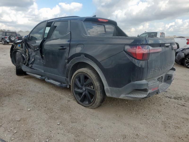 Photo 2 from auction – 2023 HYUNDAI SANTA CRUZ with VIN 5NTJCDAF4PH068046