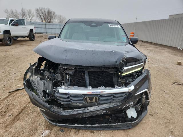 Photo 5 from auction – 2023 HONDA PILOT LX with VIN 5FNYG1H22PB028596