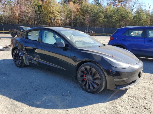 Photo 4 from auction – 2023 TESLA MODEL 3 with VIN 5YJ3E1EC6PF543498