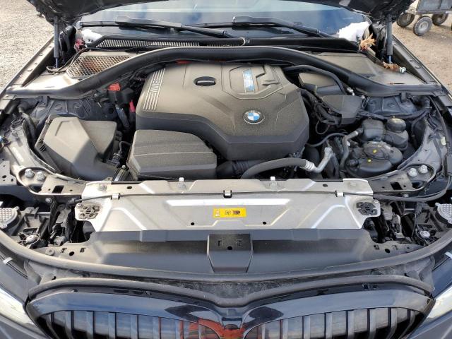 Photo 11 from auction – 2022 BMW 330XE with VIN WBA5P9C08NFM50871