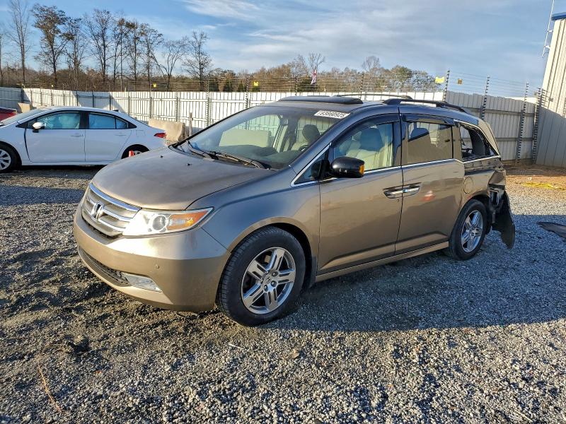 Photo 1 from auction – 2011 HONDA ODYSSEY EXL with VIN 5FNRL5H95BB030016