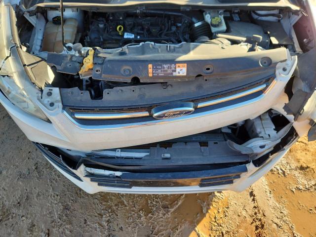 Photo 12 from auction – 2016 FORD ESCAPE TIT with VIN 1FMCU9J95GUB65818