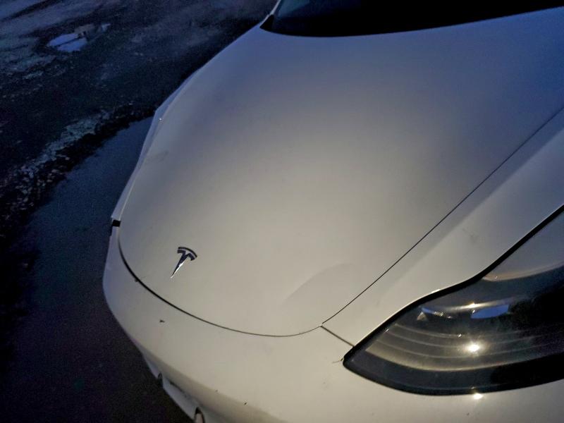Photo 11 from auction – 2023 TESLA MODEL 3 with VIN 5YJ3E1EA2PF458365