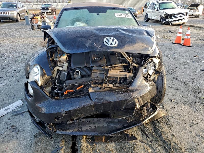 Photo 5 from auction – 2013 VOLKSWAGEN BEETLE with VIN 3VW5P7AT9DM828292