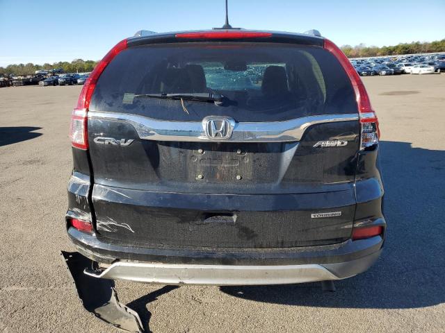 Photo 6 from auction – 2015 HONDA CR-V TOURI with VIN 5J6RM4H98FL079134