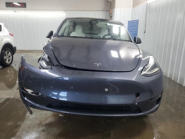 Photo 5 from auction – 2023 TESLA MODEL Y with VIN 7SAYGDEF7PF938675