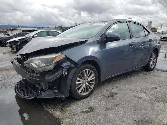 TOYOTA COROLLA L 2014 with VIN 5YFBURHE9EP169240 - Photo from auction