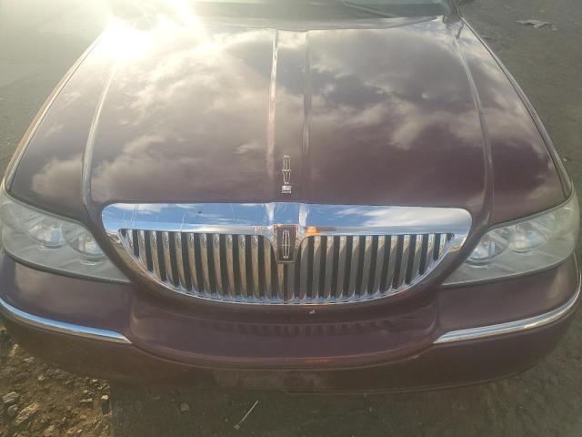 Photo 11 from auction – 2004 LINCOLN TOWN CAR E with VIN 1LNHM81W04Y662172