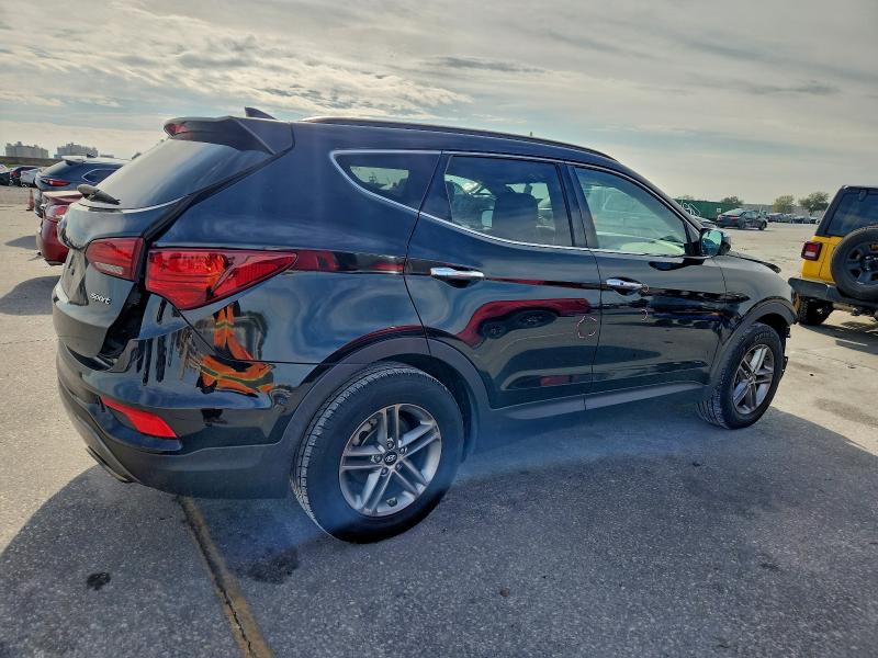 Photo 3 from auction – 2017 HYUNDAI SANTA FE S with VIN 5NMZU3LB5HH027104